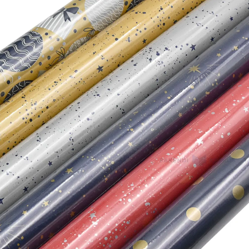 Packaging paper with different colours and star prints 0,7m wide 50g/m2, 5m/roll