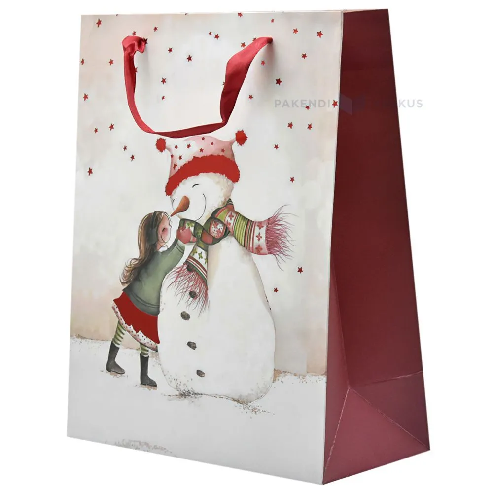 Paelsangaga tüdruk lumememme salli settimas pildiga kinkekott 26+12x32cm