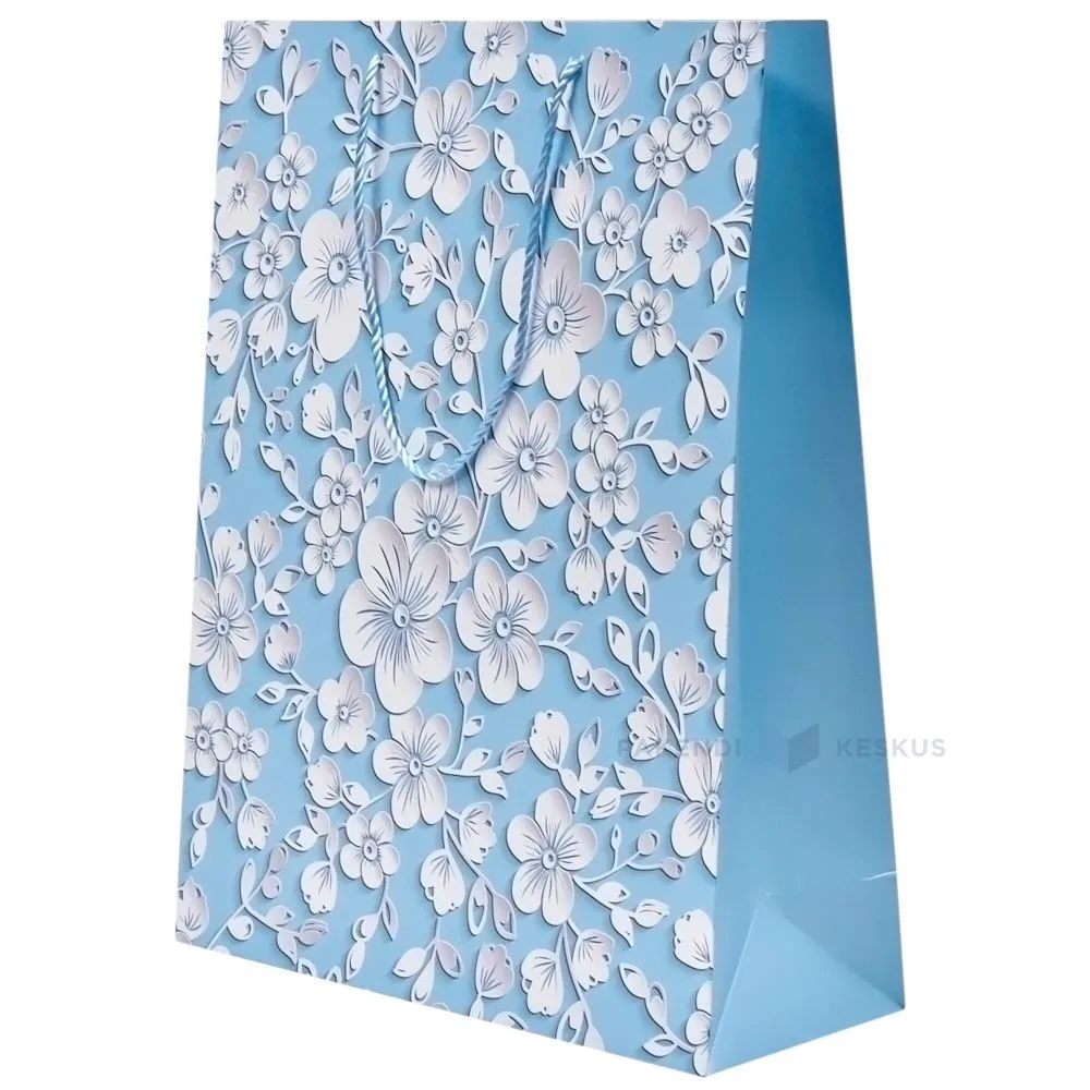 Paperikassi vaaleansininen valkoiset kukat painettuna ,  jonka köysikahvat ovat 40 + 15x50cm