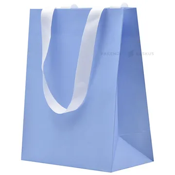 Light blue gift bag with white ribbon handles18+10x23cm