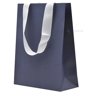 Valgete paelsangadega tumesinine kinkekott 20+8x25cm