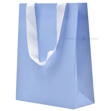 Light blue gift bag with white ribbon handles 20+8x25cm