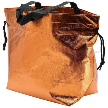 Metallic orange PP non-woven textile bag with drawstring handles 40+14x26cm